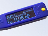 Calibration of Tweezer Meters Enabling Sub 1 pF and Sub 10 nH