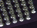 Solder Column Attachment for Absorbing Large CTE Mismatch