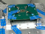 Pad Crater Initiation in Shock Using Acoustic Emission Detection