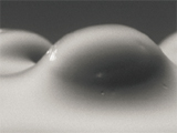 Improved SMT and BLR of 0.35 mm Pitch Wafer Level Packages
