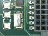 Selective Soldering Design for Reliability Using a Novel Test Board and SIR Test Method